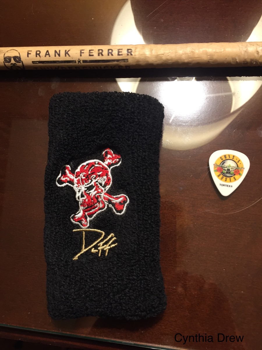 Band Member Swag, Frank Ferrer drumstick, Duff McKagan wristband and pic 