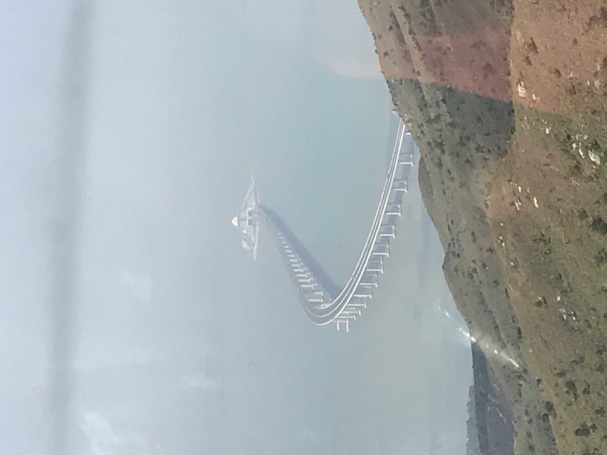 The Hong Kong Zhuhai Macau Bridge, a 34 mile bridge, tunnel system, the longest sea crossing in the world. The Bridge to nowhere!